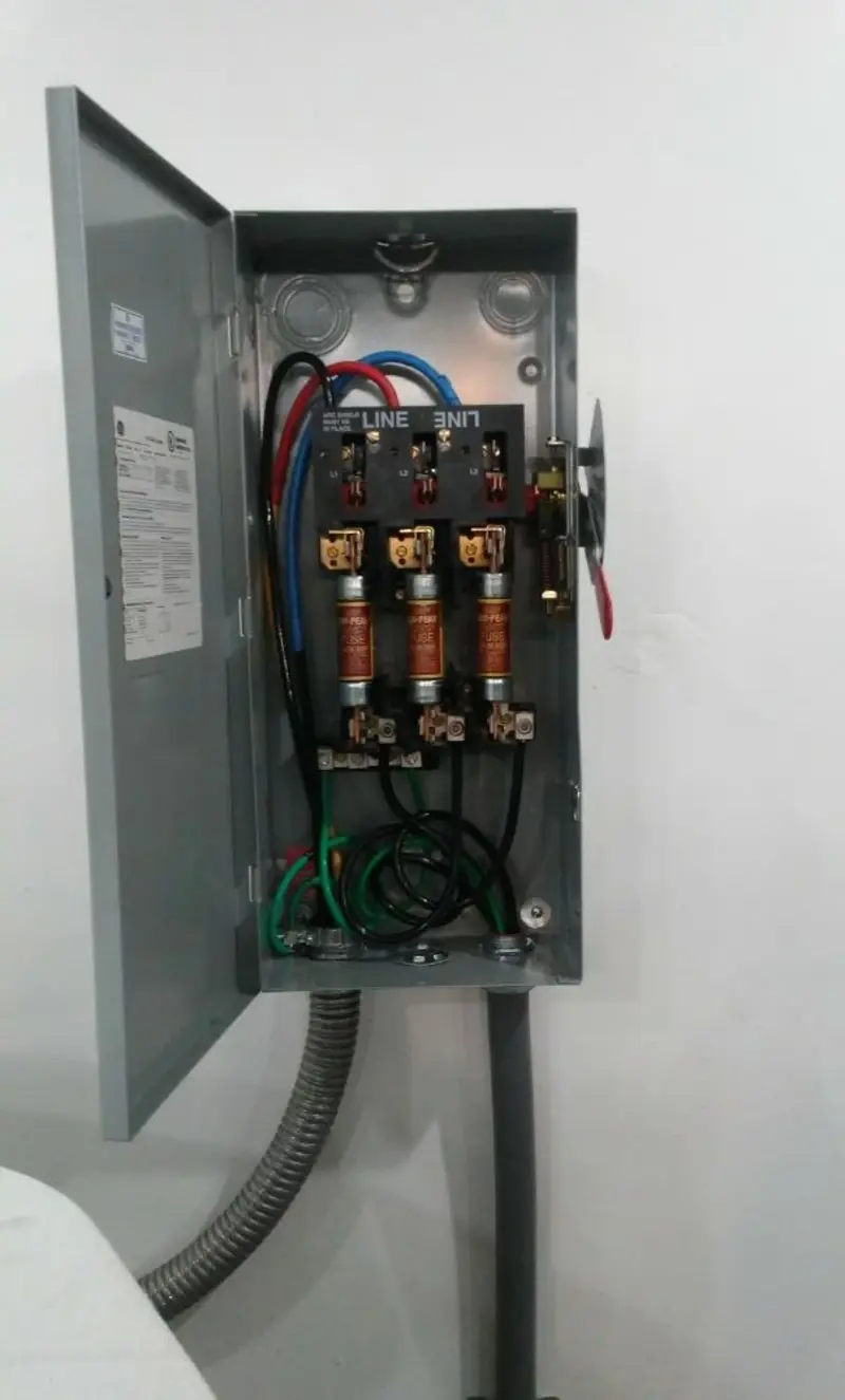 Three-phase disconnect switch installed for Smoke Detector Installation in Green Acres